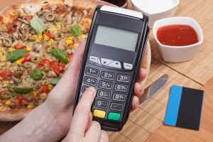 Using payment terminal for paying in restaurant, enter personal